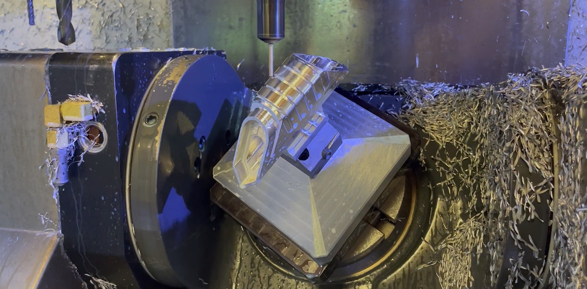 Custom Darksaber prop component being machined on a 5-axis CNC mill at Hooper Machine & Design